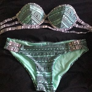 Mint green white and black swim suit, worn once